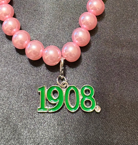 Green 1908 on Pink Pearl Bracelet